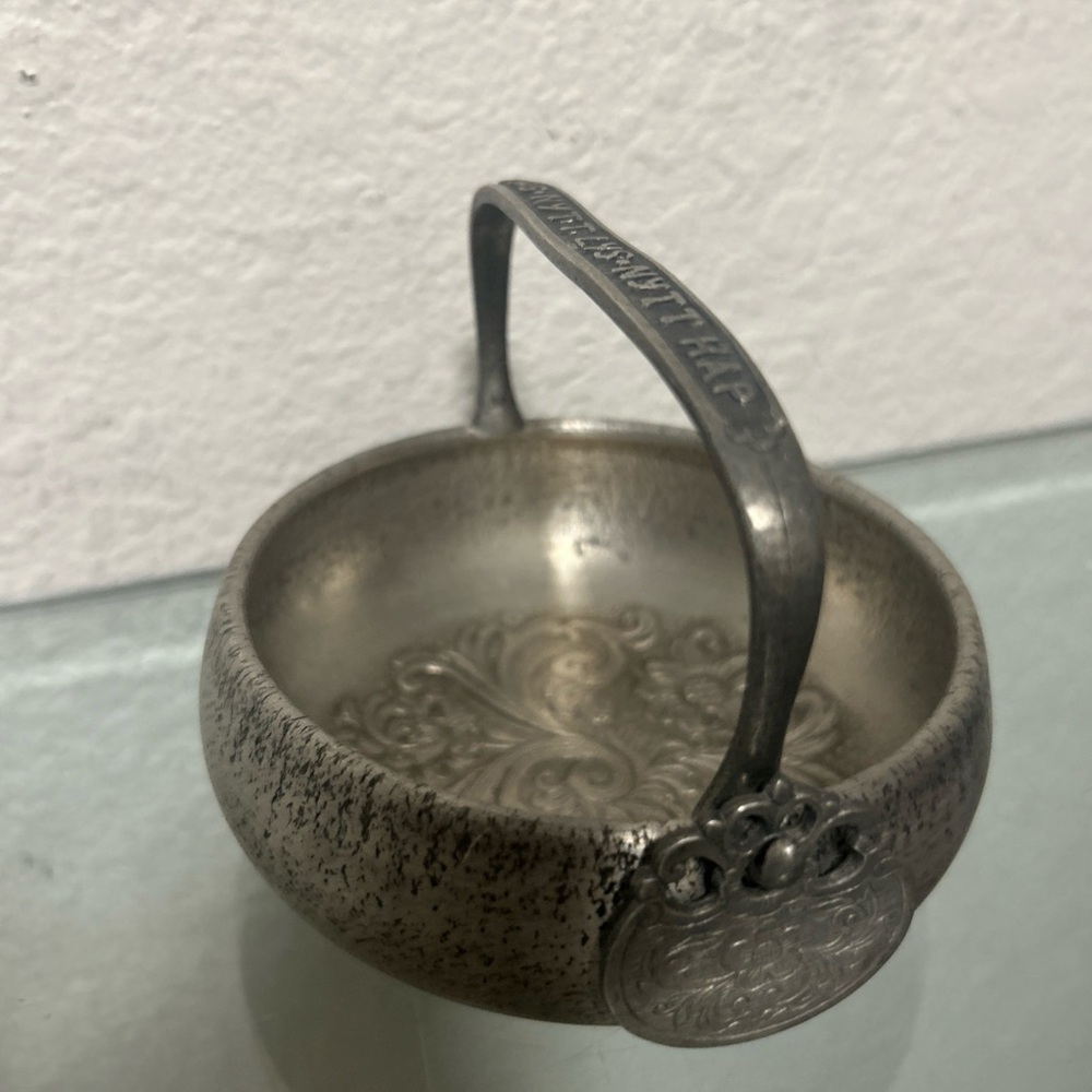 vintage Norwegian Eik Tinn pewter bowl with a handle and embossed rosemaling